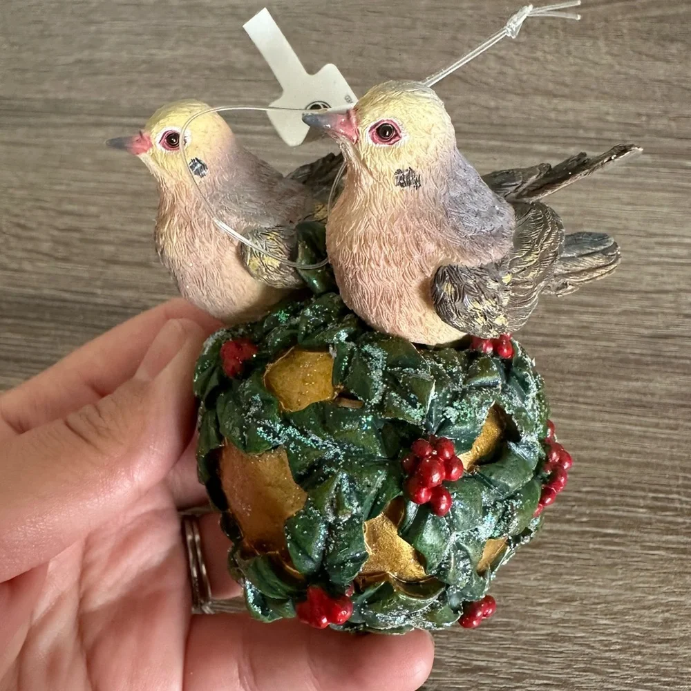 Decorative Bird Ornament with Green and Gold Accents